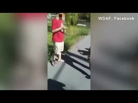 Shocking video shows bullies point gun at boy's head