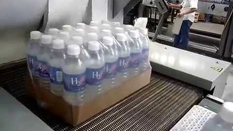 Máy rút màng co log chai, máy bọc màng co log tự động, máy đóng gói màng co log nước suối