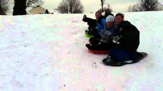 Sledding train in parkland