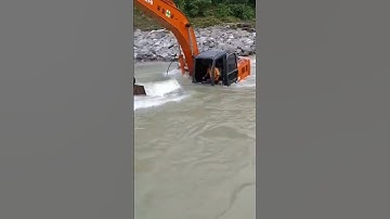 Excavator stuck in the middle of a river #shorts #ytshorts #excavator #viral #fyp #fails