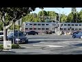 Officer pulls a man from his car moments before an oncoming train slams into it | Mashable