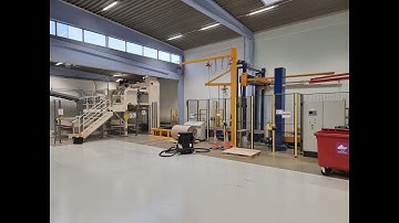 Sack palletizer and foiling line