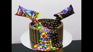 Gravity cake--kitkat gems and shots decoration