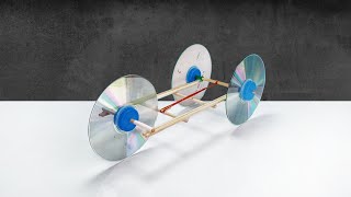 Make Rubber Band Powered Car With Recycle CD Disc - วิธีทำรถล้อซีดีพลังหนังยาง