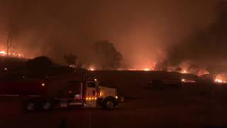 Flames devour houses as fires expand in California