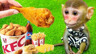 Monkey baby Bi Bon eats fried chicken with Cheese in the garden | Animals Home BiBi