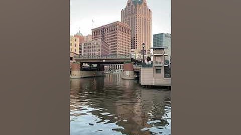 Drawbridge going up then boat coming through full video