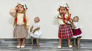 Monkey Kaka and Diem were delighted to wear their new outfits.