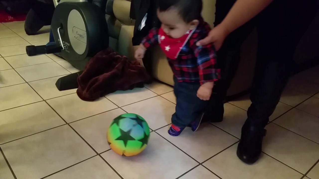 8 month old playing soccer