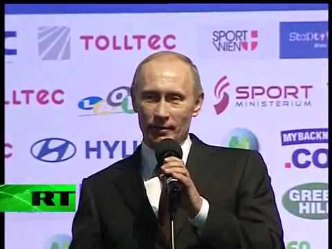 YouTube- Putin it in English PM shows language skills at judo championships in Vienna.mp4