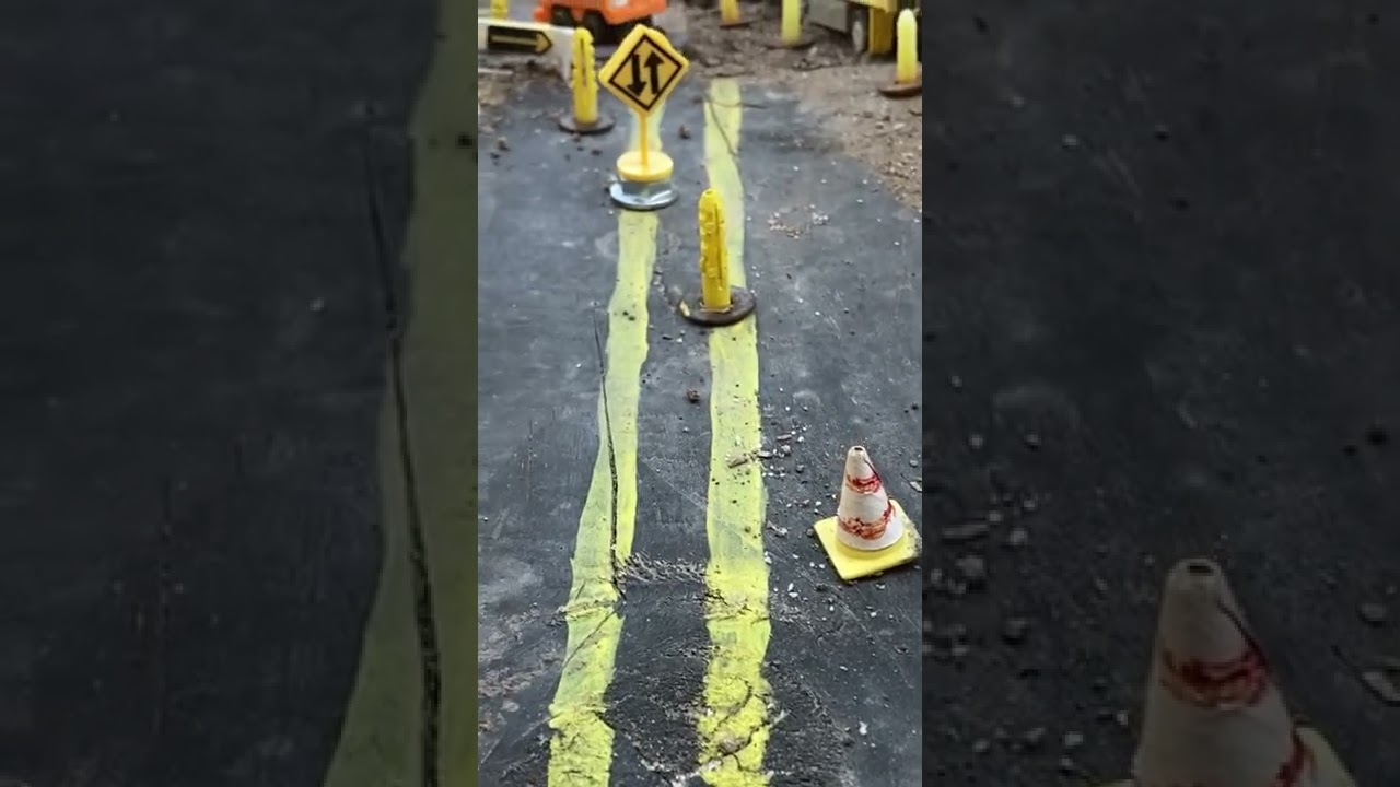 Traffic cones and sweeper
