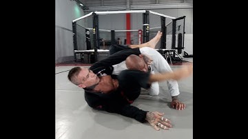 Lapel Attack From Closed Guard