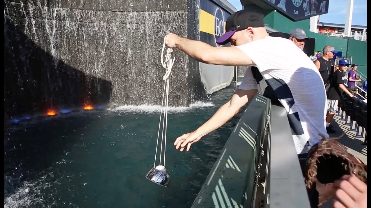 Scooping baseballs from the fountain at Kauffman Stadium 