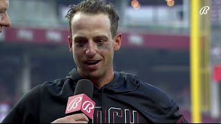 Spencer Steer celebrates the first walk-off homer of his career as he talks with Jim Day