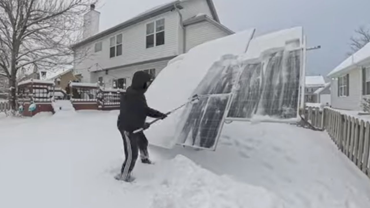 Heavy Snow Cleaning from Eco-Worthy Solar Tracker Panels.
