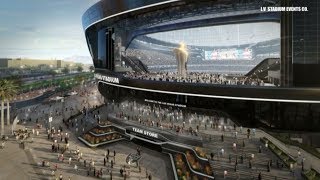 At the stadium, you can already see outline of what, we’re guessing,
will be biggest, baddest door in city., it take 10 minutes to open,
providing an opening 80 feet tall and 215 ...