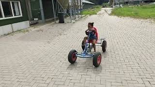 Shalyn and Shabel with Shahid driving them selves around the chicken farm close to Germany