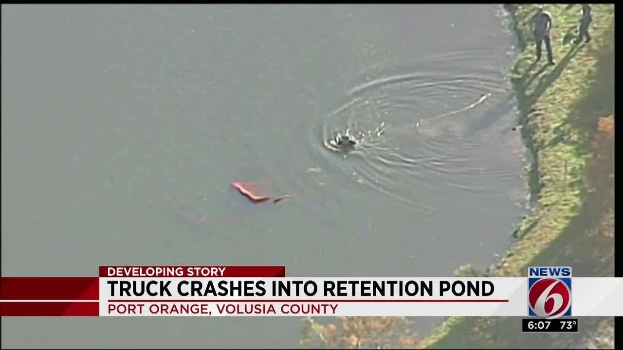 Man dies after truck crashes into retention pond - YouTube