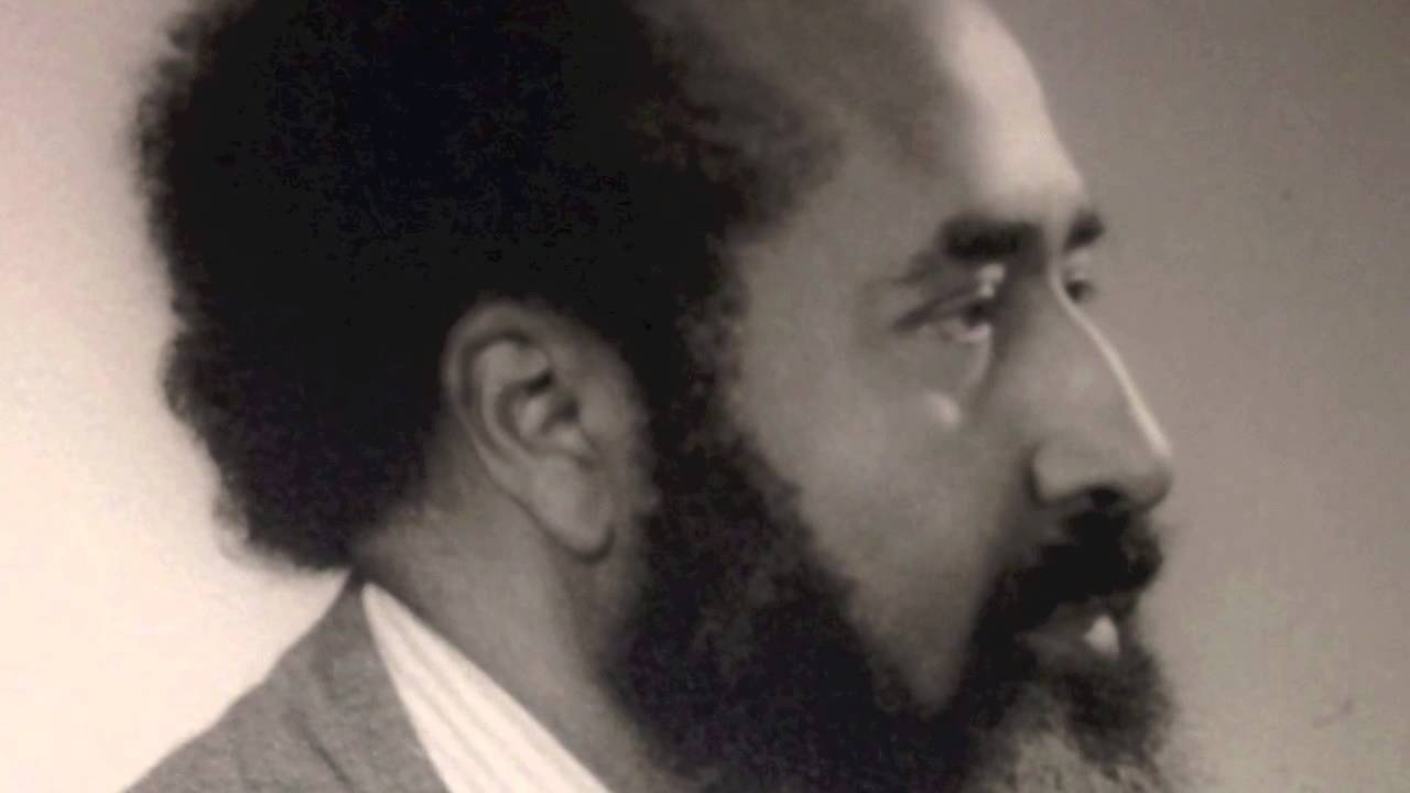 harlem check Dr. John Lawrence Holloman