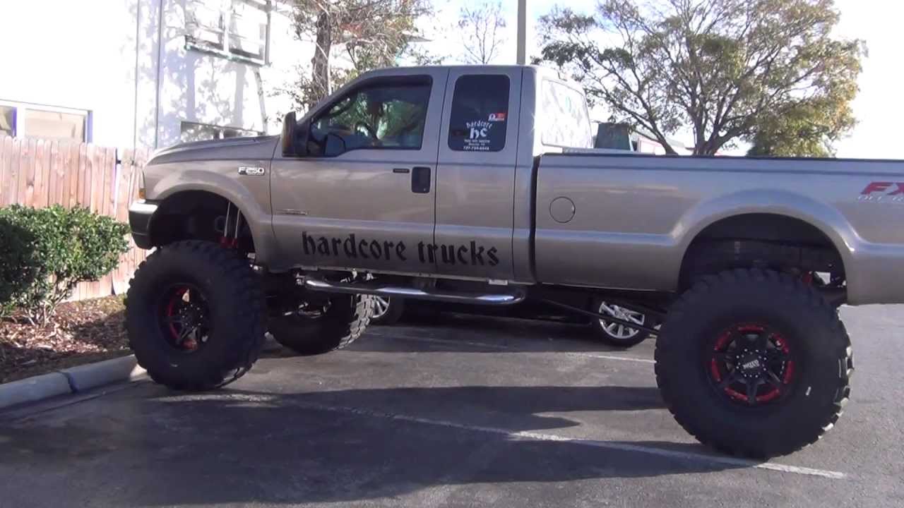 BIG REDNECK  LIFTED  UP HIGH 4WD FORD 6 0 DIESEL TRUCK  