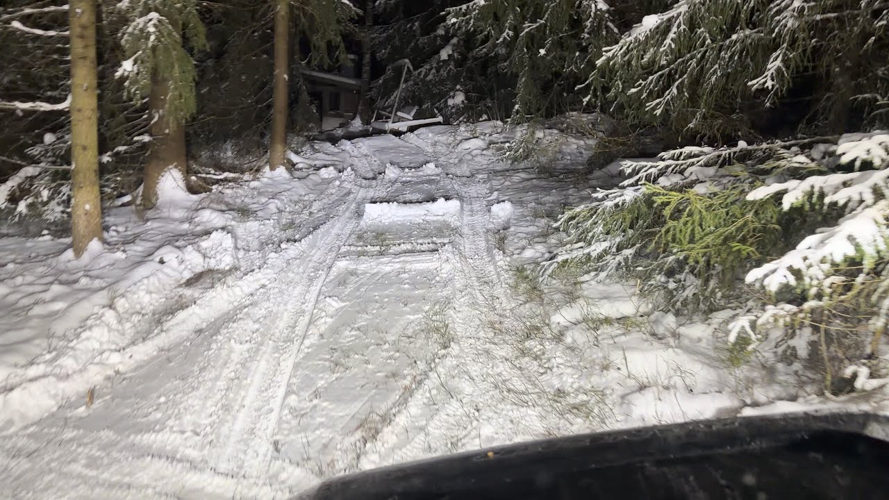 Driving in the snowy backyard