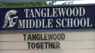 Teacher charged after bringing gun to Tanglewood Middle