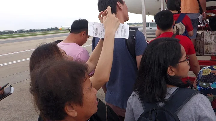 Boarding an Air Asia jet at Don Muang airport, Bangkok, Thailand