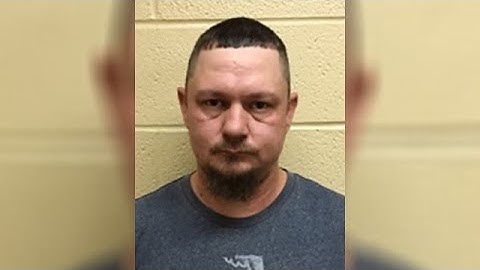 Former corrections officer charged with bringing drugs, phones into Hancock County jail