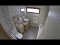 Rénovation d'une petite salle de bain réalisée par la société ATOM