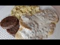 Homemade sausage gravy with biscuits