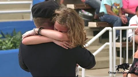 Army Captain Surprises Daughter at Dolphins in Act...