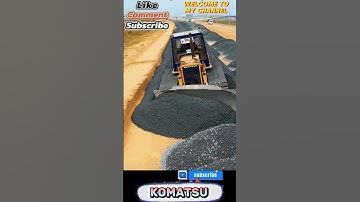 #5. DOZER KOMATSU D53P: Bulldozer At Work Leveling Gravel Stones for New Roads