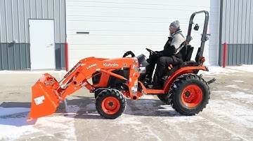 How to Use the Float Option on the Kubota B2601 Loader for Clearing Snow on Gravel