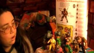 Michele Iveys Cowabunga Corner #49
Hey everyone, welcome to episode 23 of Cowabunga Corner Season 2.
In this episode I talk about the first 10 toys to come out from Playmates. From how much I love the Turtles to Shredder being shirtless. I have been collecting the toys since 1989 and have a lot of them in and out of package. In this video though I only have the out package toys with me, since my original set of the early toys is put away pretty deep at this time. Hopefully in the future Ill be able to have them in side another blog.
Please rate and comment!
Credits:
Editing: Phoenix
Camera: Star
Remember to check out our website: http://www.cowabungacorner.com/
Follow us on Twitter at: http://twitter.com/cowabungacorner
Myspace Mascot: http://www.myspace.com/tmntcon
Facebook: http://www.facebook.com/pages/Cowabunga-Corner/1821121251... (If the facebook link doesnt work for you - just search Cowabunga Corner while on facebook, it will be the top result)
Our Facebook fan page is very active with comments and photos posted through out the week that is not shared else where. Check it out for up to date information on Cowabunga Corner.
Please Comment & Rate!
Check out our Design the Cowabunga Corner T-Shirt Contest: http://www.youtube.com/watch?v=p_zh_xhf2oE
Next week on Cowabunga Corner The Turtle Con 2000 Saturday Night Party Michele Iveys Cowabunga Corner #49