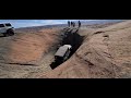 5 Guys attempt to pull Jeep Wrangler up the devils hot tub Moab Utah Hells Revenge