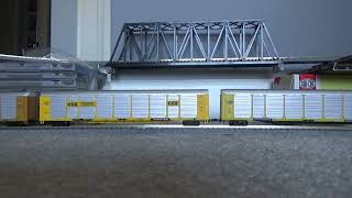 CN N scale autorack and CP intermodal stack train.