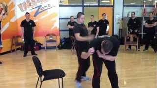 Krav Maga Ottawa In-House Seminar defence while in sitting position