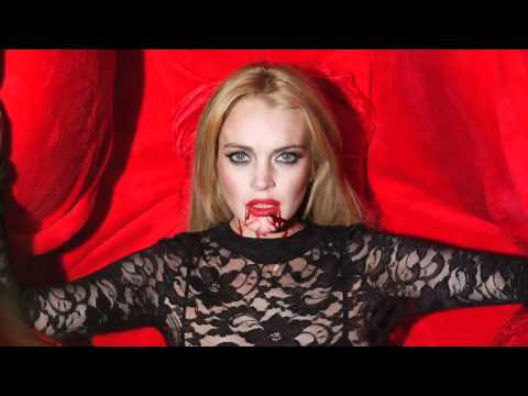 Lindsay Lohan acts like a Vampire for Tyler Shields wearing DONNA MIZANI