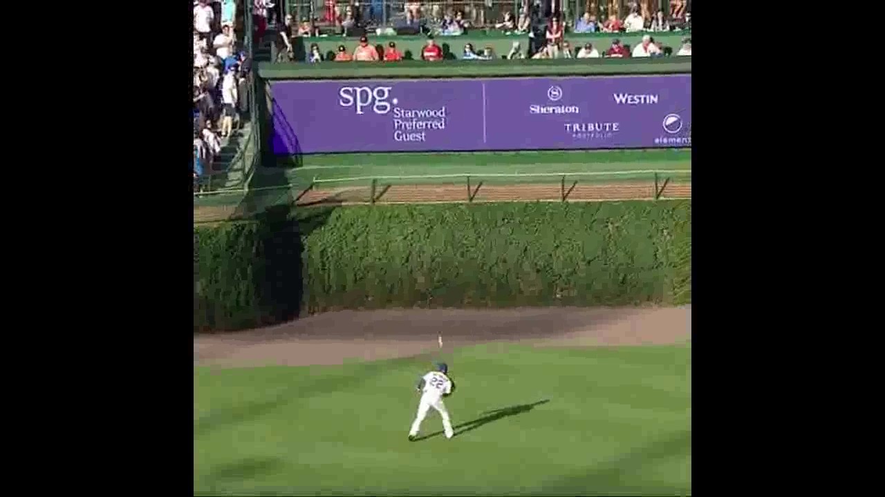 Former Cub, David Ross, plays catch with Jason Heyward from the right field seats