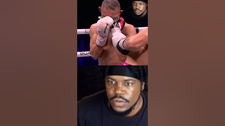 Adam Azim uppercuts Sergey Lipinets.