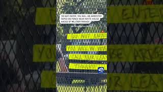'Do not enter, you will be arrested' taped on fence near White House ahead of military parade
