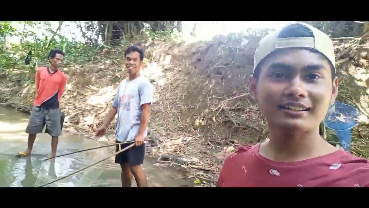 tradisi menangkap ikan sungai menggunakan akar tuba