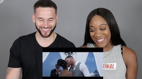 REACTING TO OUR WEDDING VIDEO!