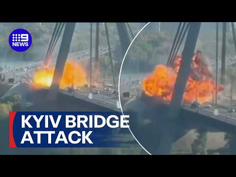 Massive fireball on Ukraine bridge sparked by Russian drone strike | 9 News Australia