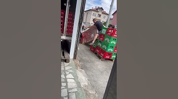 Man Rides Beverage Stack, Crates Collapse