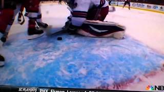 Neil kicks puck in