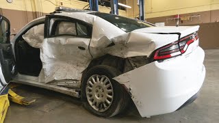 State trooper injured after car rolls off trailer on I-65 near Scottsburg