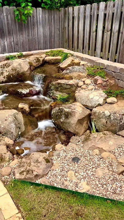 Escape the Hassle: Transform Your Backyard with a Pondless Waterfall