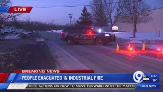 Crews battling fire at East Syracuse business