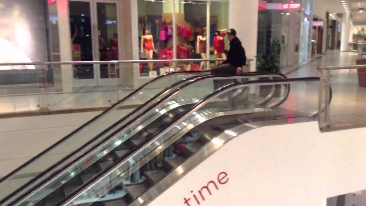 Sliding down escalator YouTube
